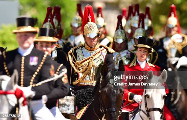 Members of The Queen's Guard march outside Windsor Castle after the wedding of Prince Harry to Ms. Meghan Markle at Windsor Castle on May 19, 2018 in...