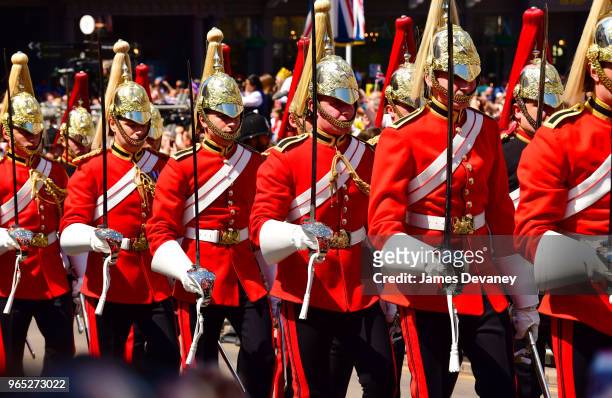 Members of The Queen's Guard march outside Windsor Castle during the wedding of Prince Harry to Ms. Meghan Markle at Windsor Castle on May 19, 2018...