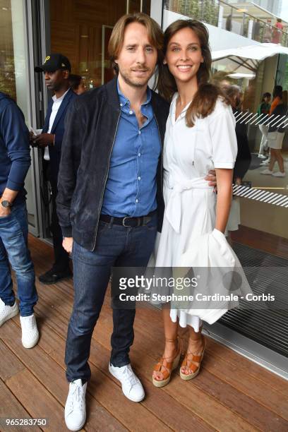 Mathieu Vergne and his wife Tv host Ophelie Meunier attends the 2018 French Open - Day Six at Roland Garros on June 1, 2018 in Paris, France.