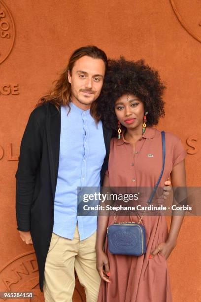 Singer Inna Modja and producer Marco Conti Sikic attend the 2018 French Open - Day Six at Roland Garros on June 1, 2018 in Paris, France.