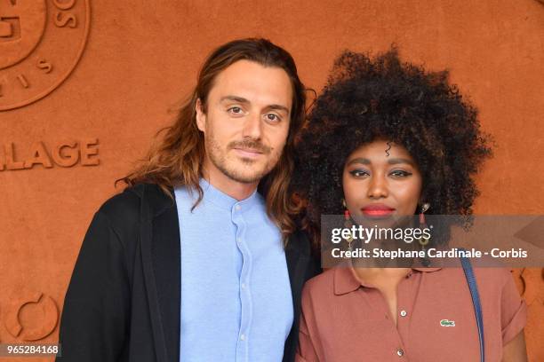 Singer Inna Modja and producer Marco Conti Sikic attend the 2018 French Open - Day Six at Roland Garros on June 1, 2018 in Paris, France.