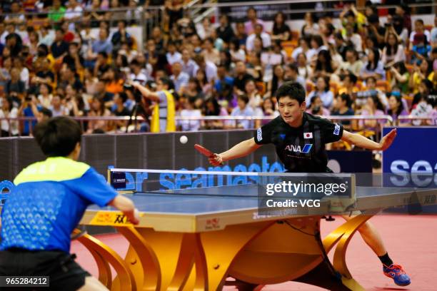 Harimoto Tomokazu of Japan competes in the Men's Singles eighth-final match against Lin Gaoyuan of China during day two of the 2018 ITTF World Tour...