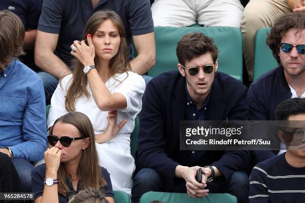 Tv host Ophelie Meunier and actor Jean-Baptiste Maunier attend the 2018 French Open - Day Six at Roland Garros on June 1, 2018 in Paris, France.