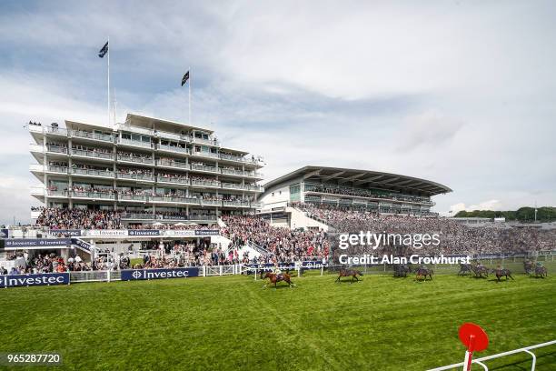 Andrea Atzeni riding Ajman King win The Investec Wealth & Investment Handicap Stakes during the Investec Ladies Day at Epsom Downs Racecourse on June...