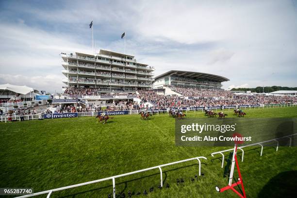 Andrea Atzeni riding Ajman King win The Investec Wealth & Investment Handicap Stakes during the Investec Ladies Day at Epsom Downs Racecourse on June...