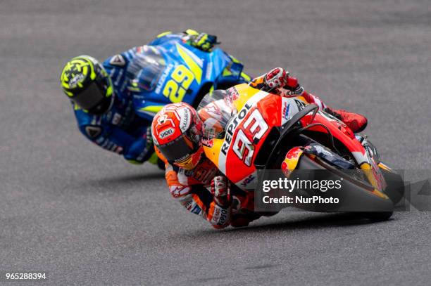 Marc Marquez of Repsol Honda Team followed by Andrea Iannone of Team SUZUKI ECSTAR during the 2018 MotoGP Italian Grand Prix Free Practice at...