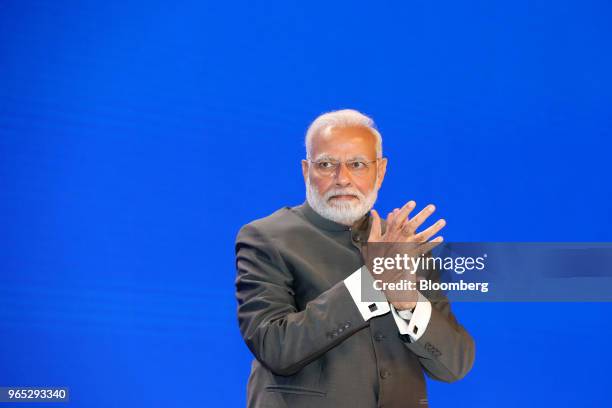 Narendra Modi, India's prime minister, prepares to applauds ahead of his keynote address during the IISS Shangri-La Dialogue Asia Security Summit in...