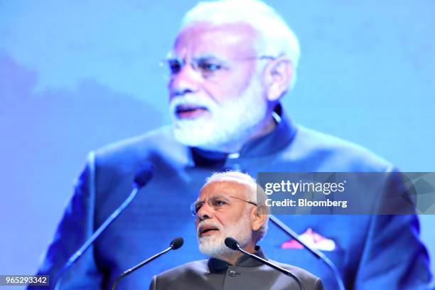 Narendra Modi, India's prime minister, delivers the keynote address during the IISS Shangri-La Dialogue Asia Security Summit in Singapore, on Friday,...