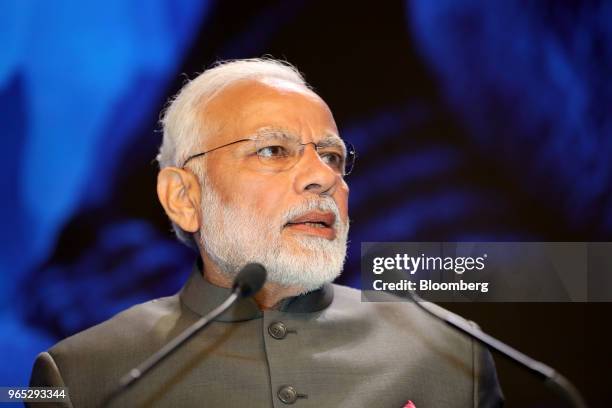 Narendra Modi, India's prime minister, delivers the keynote address during the IISS Shangri-La Dialogue Asia Security Summit in Singapore, on Friday,...