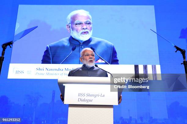 Narendra Modi, India's prime minister, delivers the keynote address during the IISS Shangri-La Dialogue Asia Security Summit in Singapore, on Friday,...