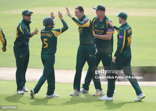 Nottinghamshire captain Steven Mullaney celebrates with Matthew Carter after catching out Worcestershire's Ben Cox during a Royal London One Day Cup...