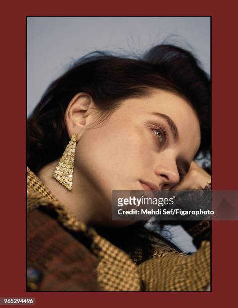 Model Isis Bataglia poses at a fashion shoot for Madame Figaro on October 11, 2017 in Paris, France. Earring by Graff. Jacket by Etro. PUBLISHED...