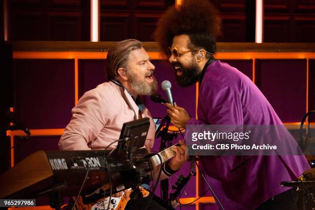 Reggie Watts and Karen, the Late Late Show band, with members Steve Scalfati, Tim Young, Hagar Ben Ari, and Guillermo Brown performs during "The Late...