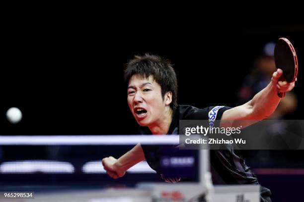 Mizutani Jun of Japan in action at the men's singles match Round of 16 compete with Wong Chun Ting of Hong Kong China during the 2018 ITTF World Tour...