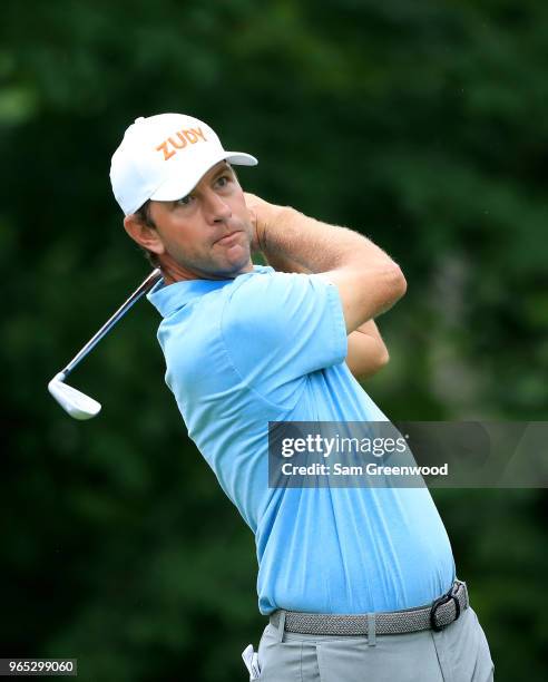 Lucas Glover of the United States watches his tee shot on the 14th hole during the second round of The Memorial Tournament Presented by Nationwide at...