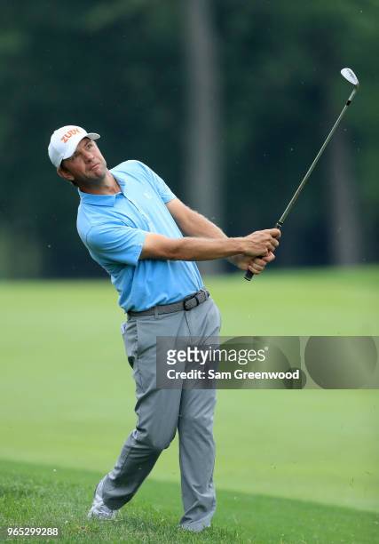 Lucas Glover of the United States hits his third shot on the 13th hole during the second round of The Memorial Tournament Presented by Nationwide at...