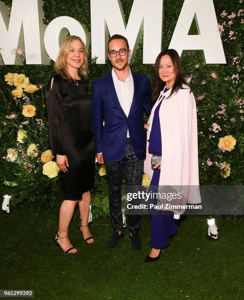 Larissa Goldston, KAWS and Anne Pasternak attend the 2018 MoMA Party In The Garden at Museum of Modern Art on May 31, 2018 in New York City.