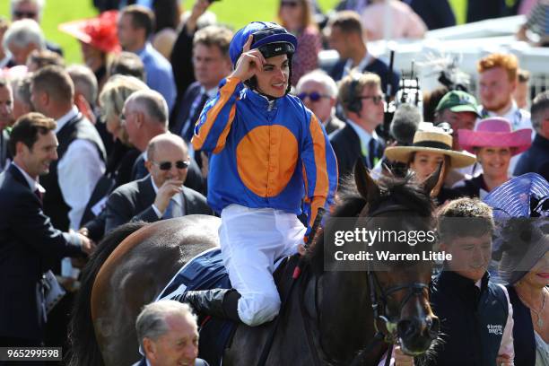 Donnacha O'Brien riding Forever Together celebrates winning the Investec Oaks as he returns to the winners circle during Ladies Day of the Investec...