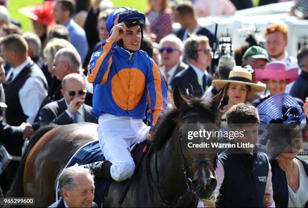 Donnacha O'Brien riding Forever Together celebrates winning the Investec Oaks as he returns to the winners circle during Ladies Day of the Investec...