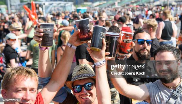 Fans celebrate Rock im Park 2018 festival at Zeppelinfeld on June 1, 2018 in Nuremberg, Germany.