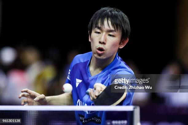 Niwa Koki of Japan in action at the men's singles match Round of 16 compete with Pitchford Liam of England during the 2018 ITTF World Tour China Open...