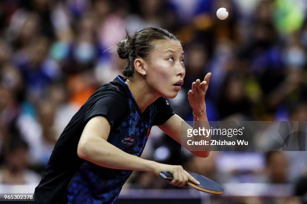 Wu Yang of China in action at the women's singles match compete with Ito Mima of Japan during the 2018 ITTF World Tour China Open on June 1, 2018 in...