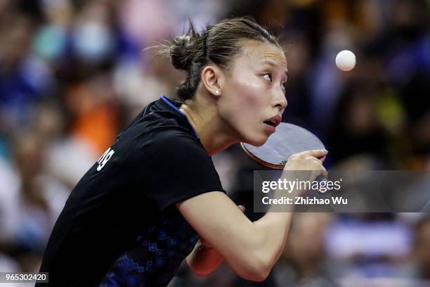 Wu Yang of China in action at the women's singles match compete with Ito Mima of Japan during the 2018 ITTF World Tour China Open on June 1, 2018 in...