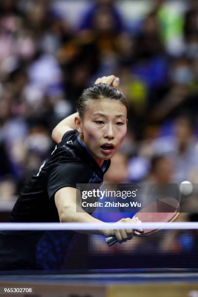 Wu Yang of China in action at the women's singles match compete with Ito Mima of Japan during the 2018 ITTF World Tour China Open on June 1, 2018 in...