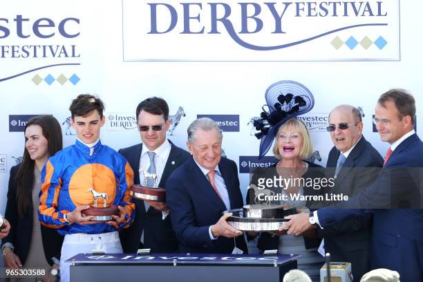 Forever Together Jockey Donnacha O'Brien, Trainer Aidan O'Brien and part owner Derrick Smith celebrate victory of the Investec Oaks during Ladies Day...