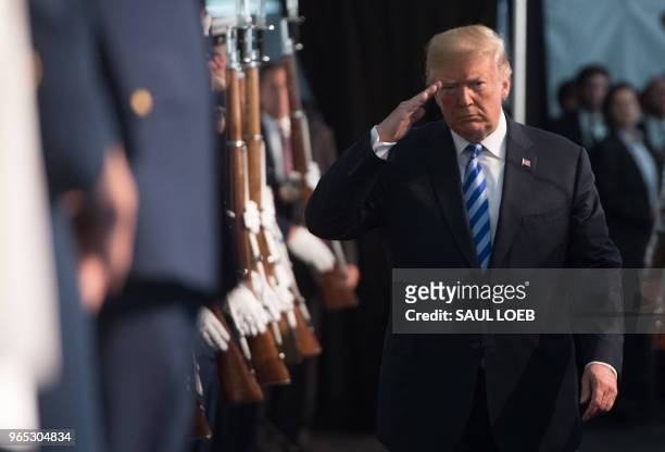 President Donald Trump arrives for a Change of Command ceremony as Admiral Karl Schultz takes over from Admiral Paul Zukunft as the Commandant of the...