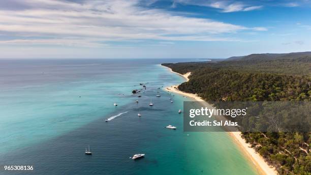 aerial view of moreton island where sea meets forest - moreton island stock pictures, royalty-free photos & images