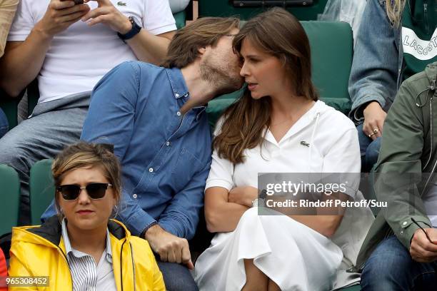 Tv host Ophelie Meunier and her husband Mathieu Vergne attend the 2018 French Open - Day Six at Roland Garros on June 1, 2018 in Paris, France.