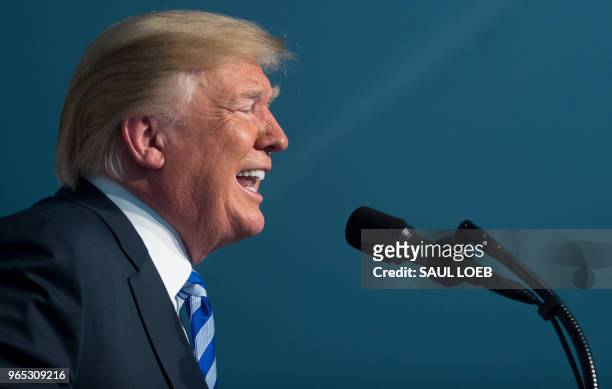 President Donald Trump speaks during a Change of Command ceremony as Admiral Karl Schultz takes over from Admiral Paul Zukunft as the Commandant of...