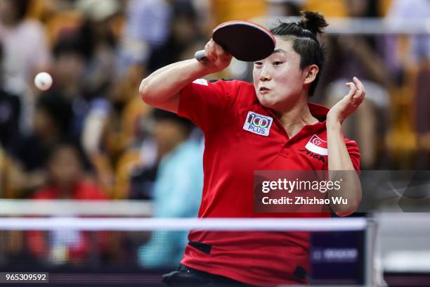 Feng Tianwei of Singapore in action at the women's singles Round of 16 compete with Sato Hitomi of Japan during the 2018 ITTF World Tour China Open...