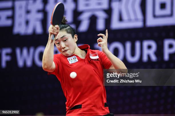 Feng Tianwei of Singapore in action at the women's singles Round of 16 compete with Sato Hitomi of Japan during the 2018 ITTF World Tour China Open...