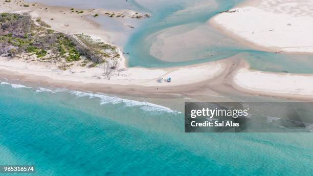 aerial view of moreton island where sea meets forest - moreton island stock pictures, royalty-free photos & images