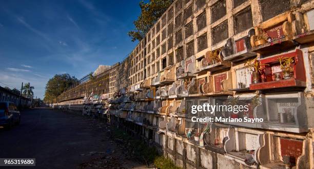 decorative gravestones in a chinese graveyard. - gram stain stock-fotos und bilder