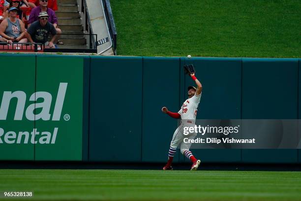 Tommy Pham of the St. Louis Cardinals makes a catch against the Philadelphia Philliesat Busch Stadium on May 19, 2018 in St. Louis, Missouri.