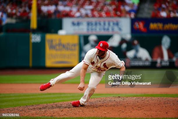 Greg Holland of the St. Louis Cardinals delivers a pitch against the Philadelphia Phillies at Busch Stadium on May 19, 2018 in St. Louis, Missouri.