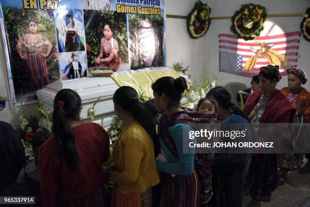 People attend the wake of Claudia Gomez, a 19-year-old Guatemalan woman who was allegedly shot and killed by a US border patrol agent, in the village...