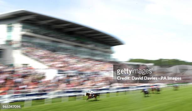 Lake Volta ridden by Silvestre De Sousa wins the Investec Surrey Stakes during ladies day of the 2018 Investec Derby Festival at Epsom Downs...