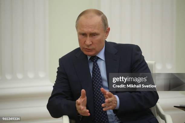 Russian President Vladimir Putin speeches during his meeing with Abu Dhabi's Crown Prince and Deputy Supreme Commander of UAE's Armed Forces Sheikh...