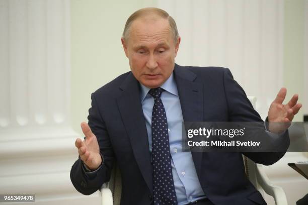 Russian President Vladimir Putin speeches during his meeing with Abu Dhabi's Crown Prince and Deputy Supreme Commander of UAE's Armed Forces Sheikh...