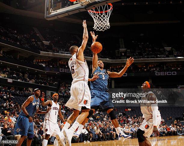 Tyson Chandler of the Charlotte Bobcats blocks against Caron Butler of the Washington Wizards on February 9, 2010 at the Time Warner Cable Arena in...