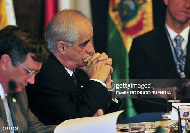 The Foreign Minister of Argentina, Jorge Taiana, listens during a gathering of the Union of South American Nations to discuss aid to the...