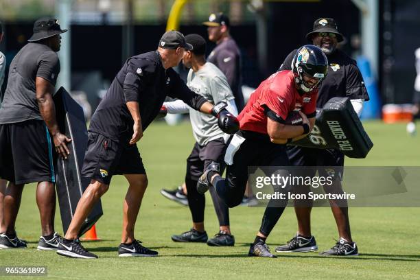 Jacksonville Jaguars quarterback Blake Bortles runs with the ball during a drill during the Jaguars OTA on June 1, 2018 at Dream Finders Homes...