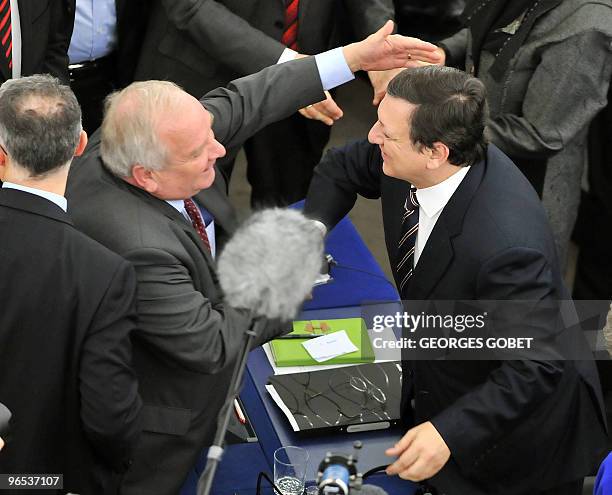 European Commission President Portuguese Jose Manuel Barroso is congratulated by Joseph Daul, chairman of the European People's Party , the largest...