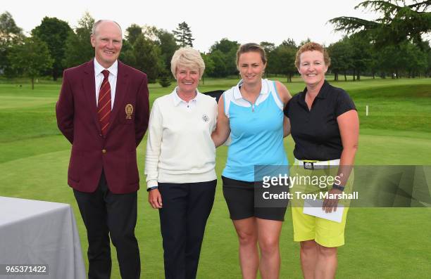 Captain of the PGA John Heggarty, Trentham Golf Club Ladies Captain Deborah Pursell pose with joint third place winners Maria Tulley of Piltdown Golf...