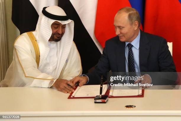 Russian President Vladimir Putin and Abu Dhabi's Crown Prince and Deputy Supreme Commander of UAE's Armed Forces Sheikh Mohammed bin Zayed bin Sultan...