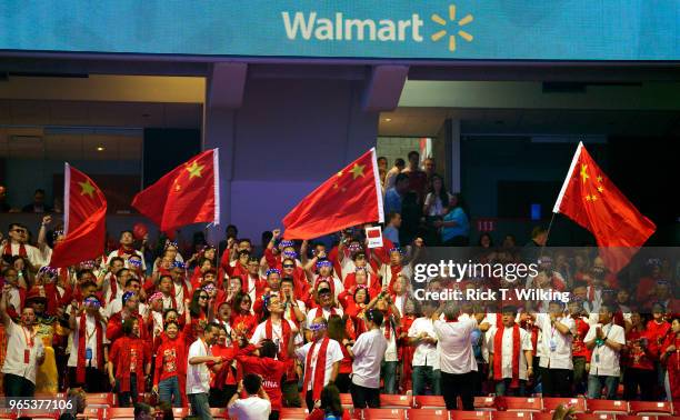 Walmart associates from China during the annual shareholders meeting event on June 1, 2018 in Fayetteville, Arkansas. The shareholders week brings...